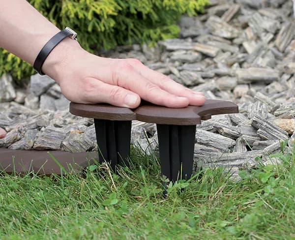 Jak układać palisady ogrodowe plastikowe - praktyczne porady i wskazówki